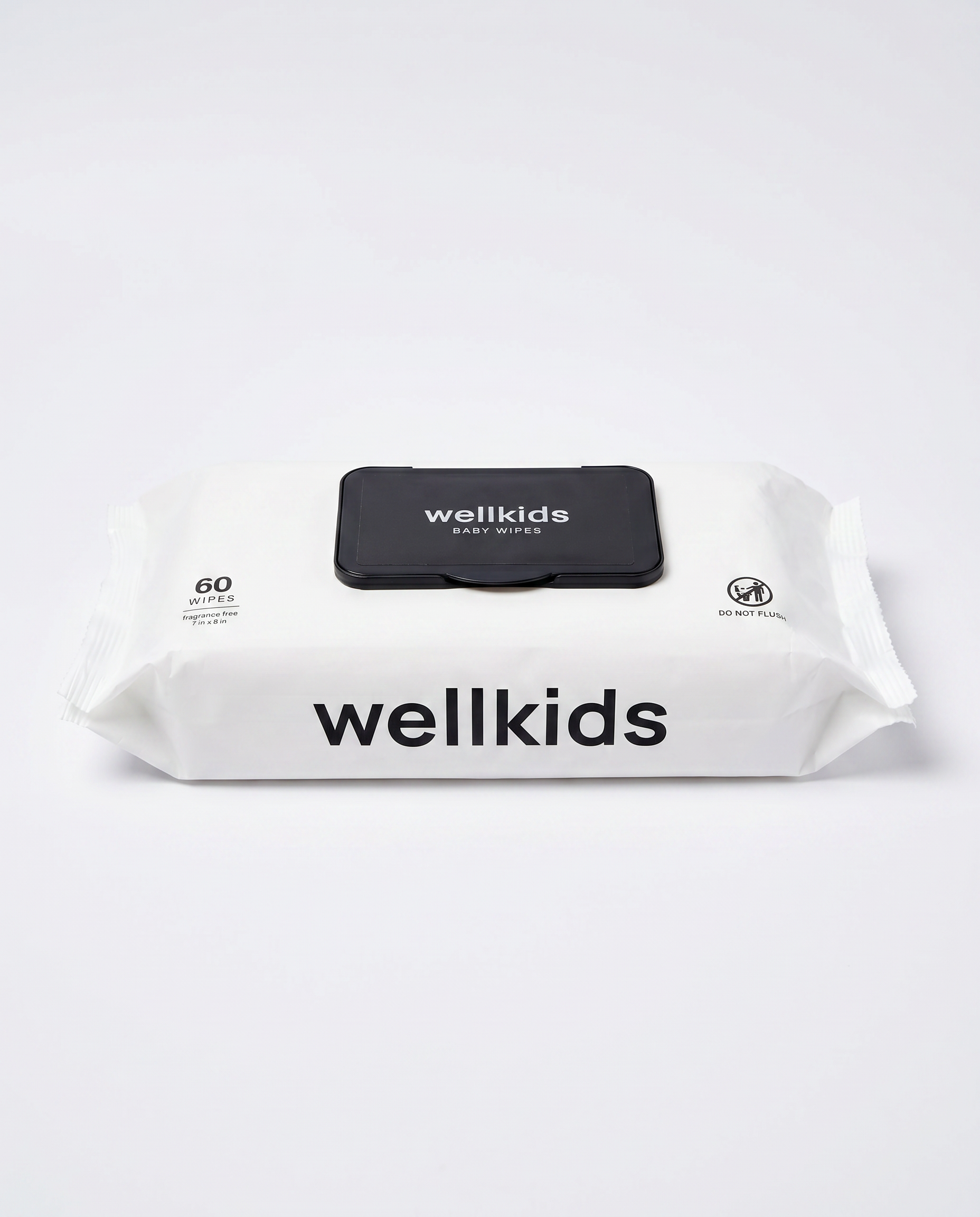 A pack of Wellkids baby wipes in a white resealable package with a black flip-top lid and black printed branding, photographed on a clean white background.
